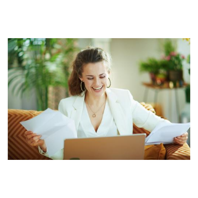 woman reading mail with computer