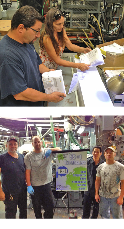 Tension team engaged in the quality process of Lean Sigma. Four men standing next to a sign that reads: Sort, Straighten, Shine, Standardize, Sustain, Safety