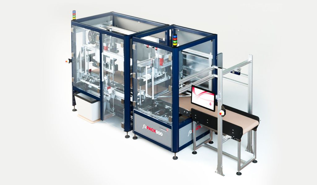 Modern automated right-size packaging machine for eCommerce order fulfillment. It has transparent panels, metal frames, and control lights, connected to a conveyor belt and a computer monitor, shown in a clean, well-lit environment.